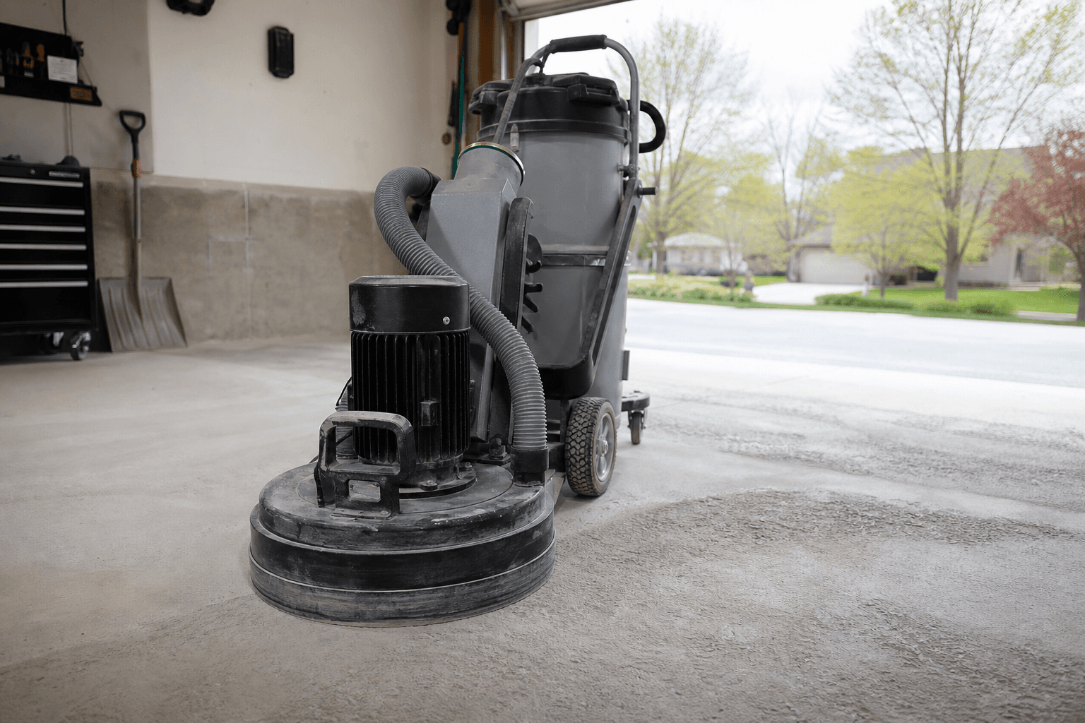 Garage floor diamond grinding with dust extraction in Metro Detroit